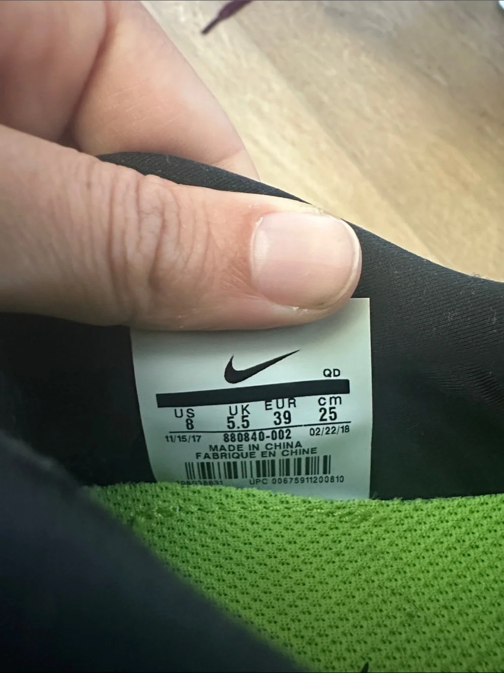 Nike Grey and Black Knit Sneakers with White Swoosh